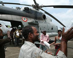 The Indian government has sent in thousands of troops, helicopters and boats to help with the rescue effort